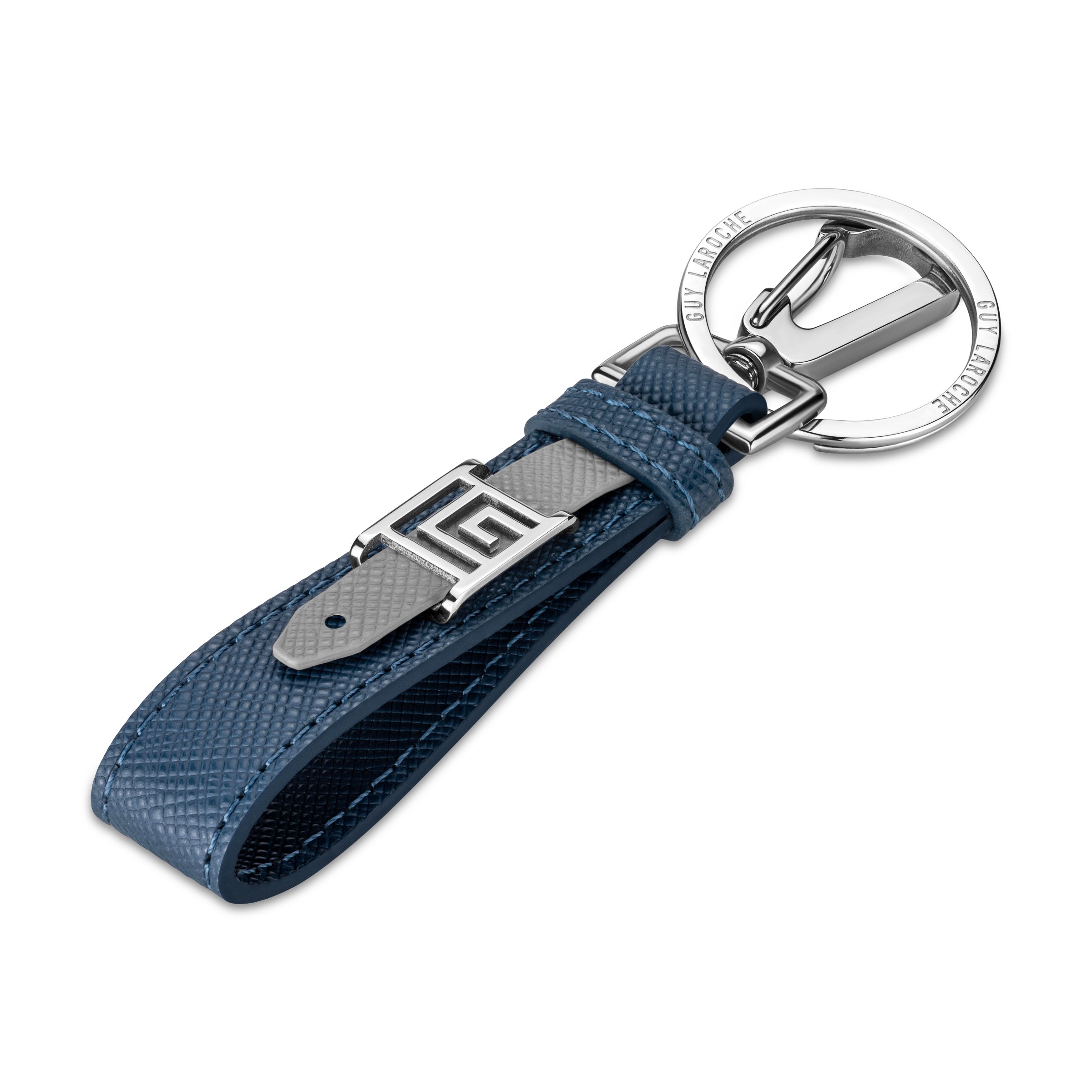 Blue leather keyring, gray strap, silver-toned geometric 'G' buckle, and 'GUY LAROCHE' engraved keyring.