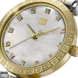 Gold-toned watch with engraved Greek key bezel, white mother-of-pearl dial, gold-toned hands, crystal markers, and two-toned