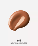 Swatch of Guerlain Terracotta Le Teint fluid foundation in shade 6N Neutral, showcasing its smooth texture and rich, deep beige tone, available at blue salon