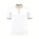 White knit short-sleeve polo with beige collar and cuffs, both striped black and white. Gold-toned front zipper.