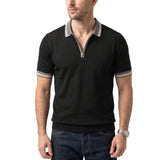 Black short-sleeved knit polo shirt with a grey collar and cuffs, both featuring two thin beige stripes. It has a silver-tone
