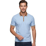 Light blue short-sleeve polo with brown collar and cuffs, both striped white. Features a brown quarter-zip placket with a sil