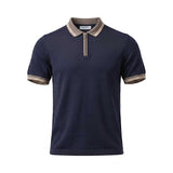 Navy blue short-sleeved knit polo shirt with a taupe ribbed collar and cuffs featuring white and beige stripes. Has a beige q