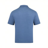 Blue short-sleeved polo shirt, back view, with a textured knit fabric and a classic collar.