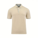 Beige short-sleeved polo shirt with a light blue contrast collar and placket, featuring two light buttons and ribbed cuffs.