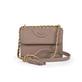 Front view of a taupe leather GAIA crossbody bag against a white background, showing the gold chain strap with an interwoven leather cord and a large decorative leather tassel.