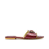 Side view of a GAIA Maron croc-embossed flat sandal with gold trim and a crystal-embellished strap from BLUE SALON.