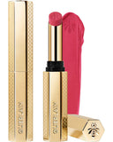 Guerlain KissKiss Honey-Infused Matte Lipstick in its signature slim golden honeycomb case, featured alongside an open bright rose-pink lipstick bullet and creamy velvety color swatch, available at blue salon.