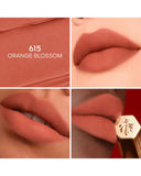 Lipstick shade 615 Orange Blossom shown on lips and close-up of lipstick.