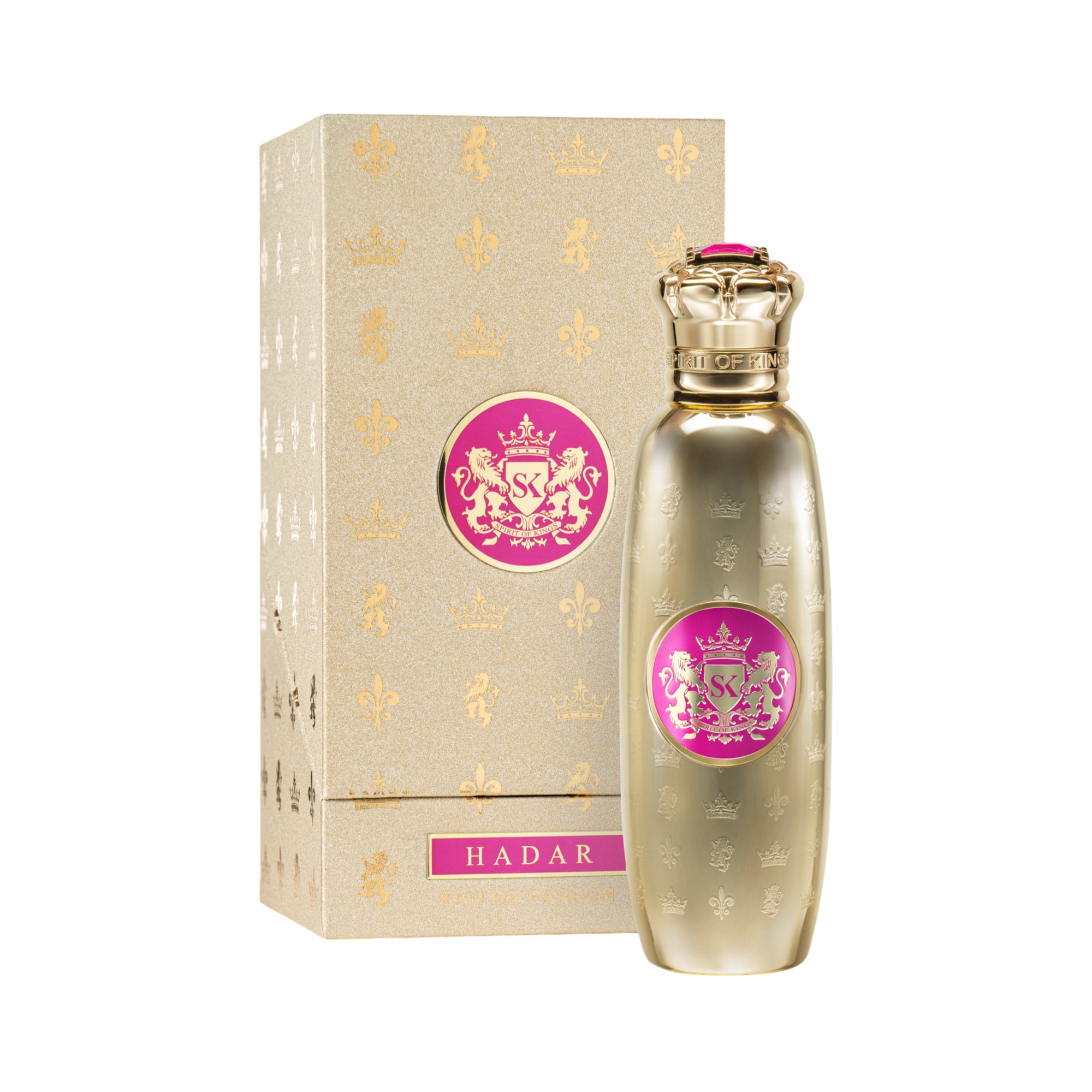 Gold-toned perfume bottle with a crown cap, pink jewel, and pink crest label. Matching gold-toned box, both with embossed pat