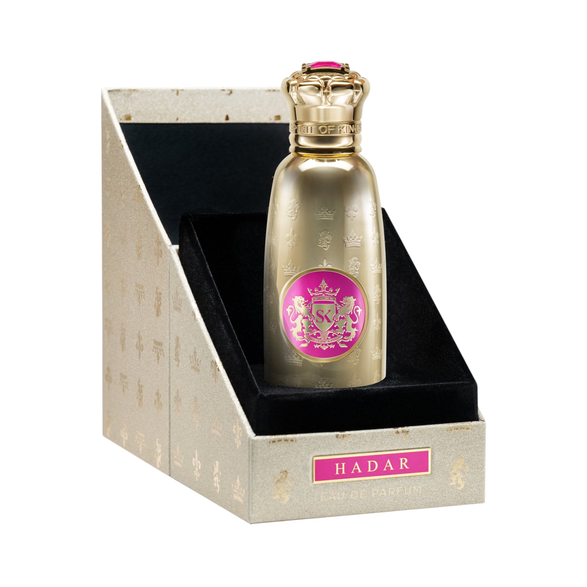 Gold-toned perfume bottle with embossed crowns, a pink circular label featuring a gold crest, and a crown-shaped cap with a p