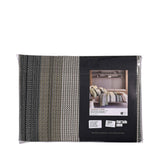 Duvet cover set with textured vertical stripes in a gradient of black, grey, and olive green.