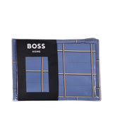 Blue duvet cover and pillow case set with a plaid pattern of thin white, brown, and black lines.