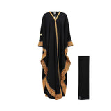 Front view of a black Kaftan Abaya featuring golden-orange embroidered borders and a matching scarf.