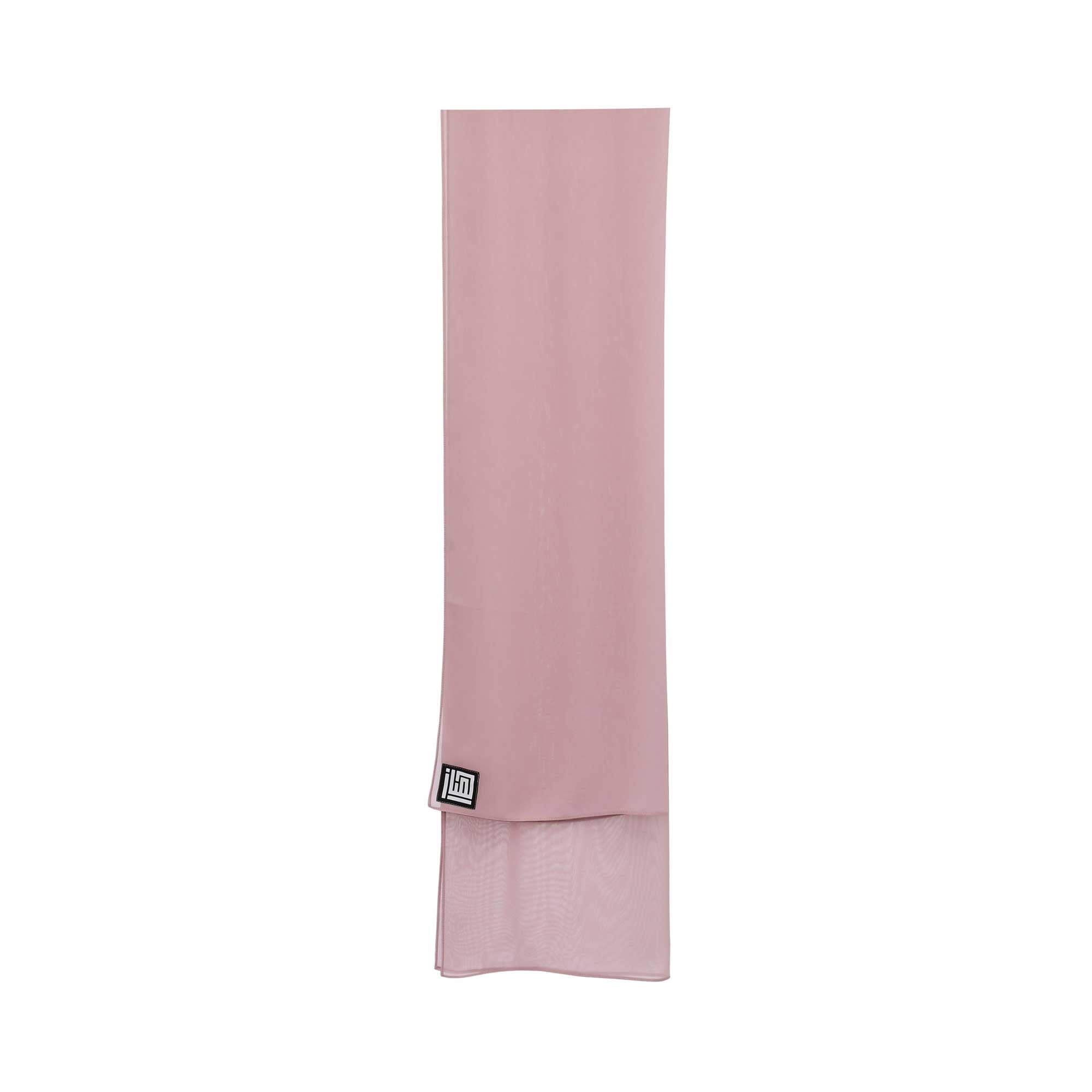 Another angle of the dusty rose hijab, focusing on the sheer material and the visible brand logo, clearly displaying the color and texture