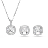 A high-resolution studio close-up of the 2-piece Swarovski Una Angelic jewelry set, highlighting the square cushion-cut white crystal pendant and the matching pair of pavé halo stud earrings against a clean background.