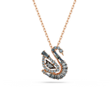 A high-resolution close-up studio shot of the Swarovski Swan pendant necklace, highlighting the intricate mixed-cut black and smoky crystals forming the iconic swan motif against a warm 18K rose gold finish.