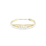 A high-resolution direct frontal studio shot of the Swarovski Mesmera double-strand bracelet laid out horizontally, displaying the parallel alignment of its tennis strand, polished gold bar, and central mixed-cut crystal cluster.