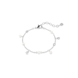 A high-resolution direct frontal studio shot of the Swarovski Imber bracelet laid out on a white surface, displaying its alternating pattern of white crystal pearls and clear bezel crystals on a rhodium-plated chain.