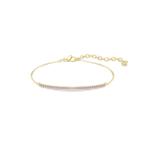 A high-resolution direct frontal studio shot of the Swarovski Only bracelet laid out on a white surface, displaying its radiant purple crystal-paved bar focal point and its adjustable gold-finished chain.