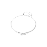 A high-resolution front studio view of the Swarovski Matrix necklace, showcasing the contemporary crossover layout between the polished silver-tone bar and the glittering line of round white crystals.