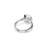 A detailed high-angle rear perspective view of the Swarovski Una Angelic halo ring, displaying the clean lines of the inner band, the solid under-bezel cup support, and the bright, mirror-polished rhodium finish of the lower shank.