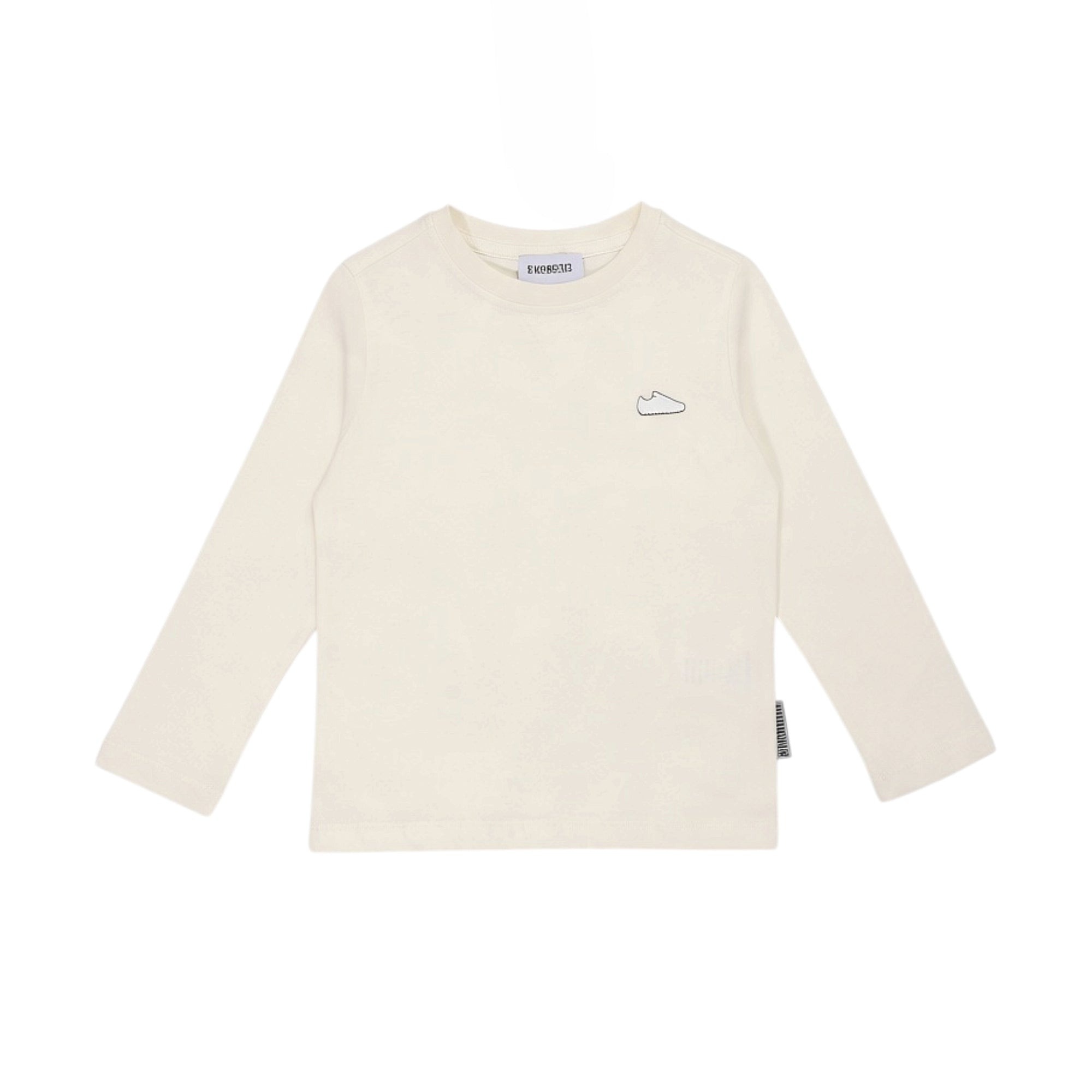 Ivory long-sleeve t-shirt for kids with a crew neck and an embroidered black trainer outline on the chest.