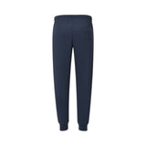 Blue navy sweatpants with an elastic drawstring waist, a back pocket with an embossed circular logo, and ribbed cuffs.