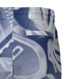 Blue and white shorts with an abstract halftone dot pattern. Features an elastic waistband and a back flap pocket with a blue