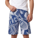 Blue and white relaxed-fit shorts with an abstract dot-matrix pattern and drawstring waist