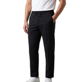 Black men's relaxed-fit trousers with an elasticated drawstring waistband and side pockets.