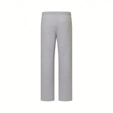 Grey melange knit sweatpants with an elastic waistband, one back welt pocket, and straight legs with plain cuffs.