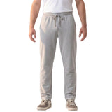 Light grey melange relaxed-fit trousers with an elasticated drawstring waist and side pockets.