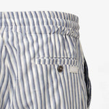 Little boy blue and white striped shorts with an elasticated waistband, a back buttoned pocket, and a white brand label.