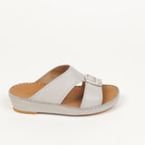Light grey leather slide sandal with two crossing straps, a silver-toned buckle, and a light brown insole and outsole.