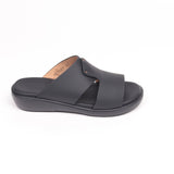 Black gommato slide sandal with two crossing straps, secured by two small gold-toned rivets. Black footbed and sole.
