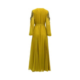 Back view of the mustard yellow SHAIRA kaftan showing the clean drape of the chiffon fabric, detailed beadwork on the shoulders, and the matching tie-belt cinching the waist.