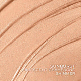 Iridescent peachy-champagne tint with sunburst shimmer, displayed in multiple textured swatches.