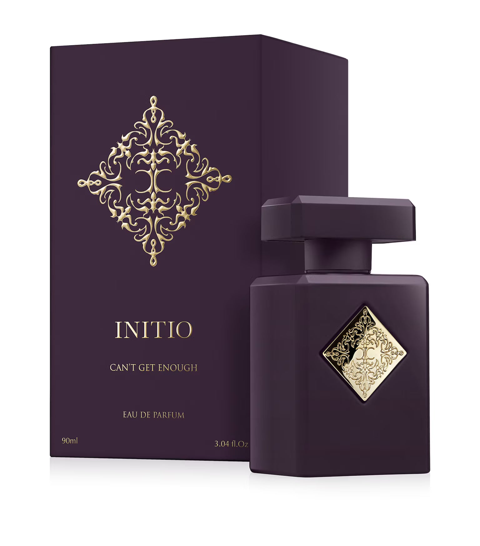 Initio Parfums Privés Can't Get Enough Eau de Parfum displayed in its classic matte deep purple bottle, centered with a highly detailed, reflecting gold diamond emblem, available at blue salon.