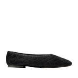 Black quilted suede ballet flat with a pointed toe and low heel.