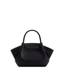 Black pebbled mini tote bag with a single top handle, cinched sides, and white contrast stitching.