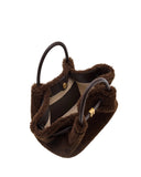 Dark brown faux fur mini tote bag with two dark brown top handles, a gold-toned magnetic snap closure, and an F-shaped gold-t