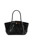 Black faux crocodile tote bag with two top handles, a gold-toned rectangular clasp on a front strap, and side cinching detail