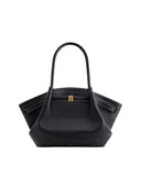 Black pebbled leather medium tote bag with two top handles, white contrast stitching, and a gold-toned rectangular clasp.