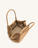 Tan pebbled leather medium tote bag with two rounded top handles, a gold-toned snap closure, and multiple interior pockets.