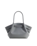 Grey pebbled leather medium tote bag with a single top handle, cinched sides, and white contrast stitching.
