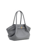 Medium grey textured tote bag with two top handles, white contrast stitching, and a gold-toned rectangular buckle on the fron