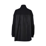 JIJIL black zip-front jacket with sheer mesh front panel, long sleeves, high neckline, and elastic cuffs, displayed on a white background.