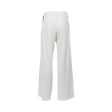 JIJIL white women’s jogger trousers with black side stripes, elastic waistband, and relaxed fit, photographed on a white background.