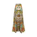 A long, wide skirt with an intricate bohemian paisley and tribal pattern in olive green, beige, black, orange, and turquoise, shown against a plain white background.